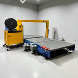 Strapex SMG 65 automatische Umreifungsanlage mit Fördertechnik und modularen Gliederbandförderanlage
